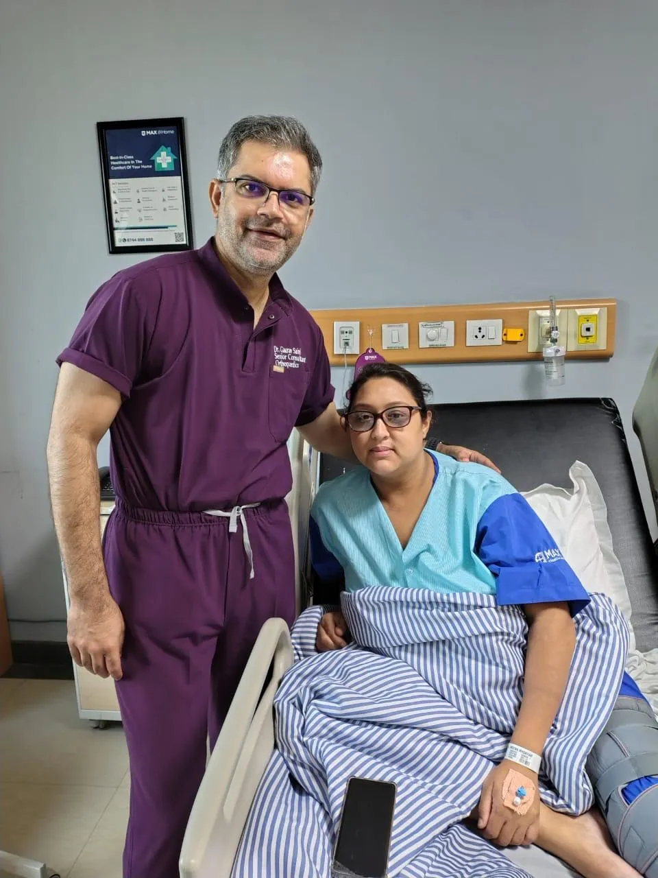Dr. Gaurav Saini analyzing patient X-ray during orthopaedic trauma care consultation